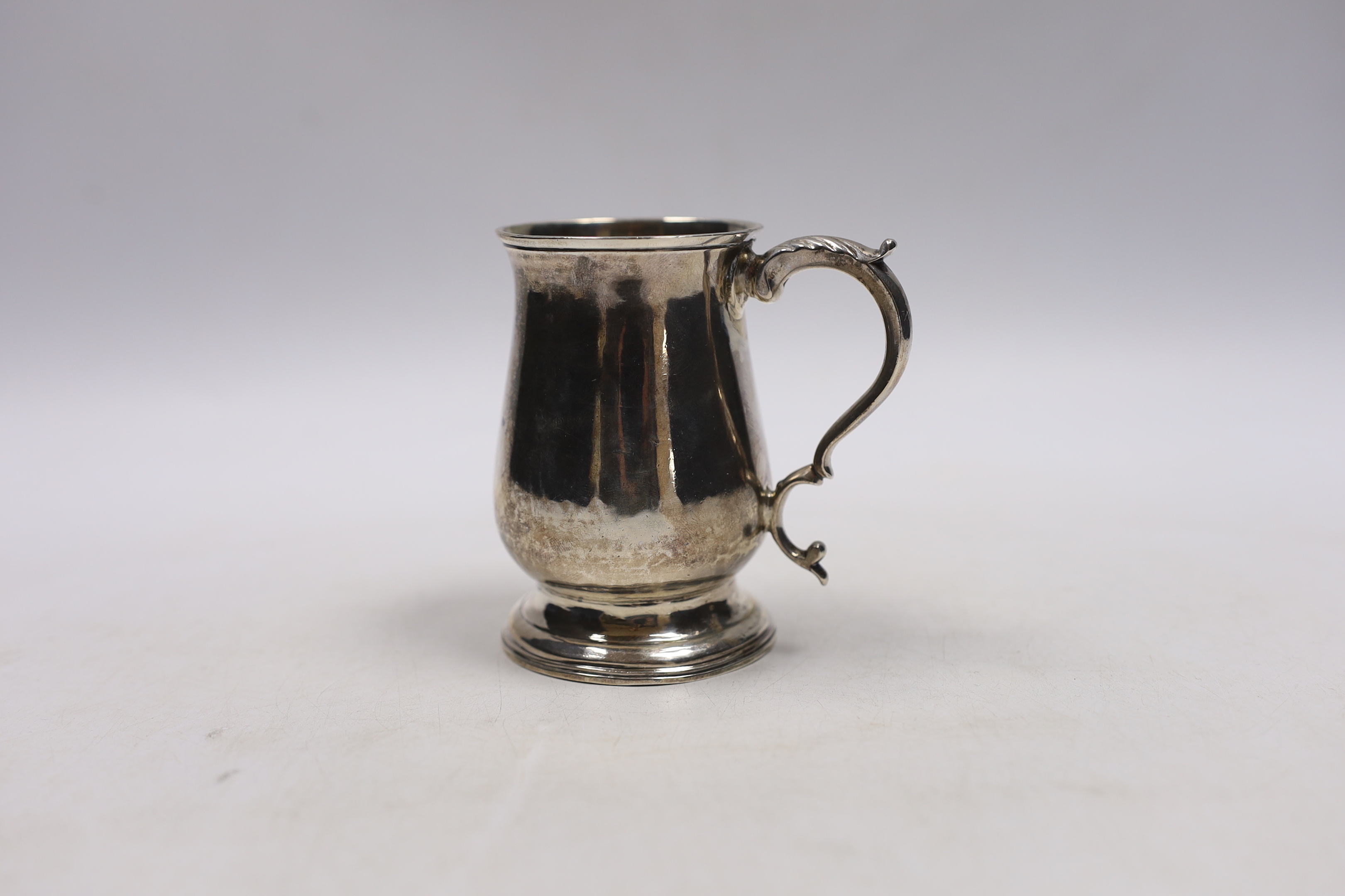 A George III small silver baluster mug, Sutton & Bult, London, 1782, 85mm.